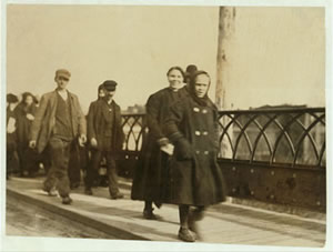 Young girl crossing the bridge on her way to work